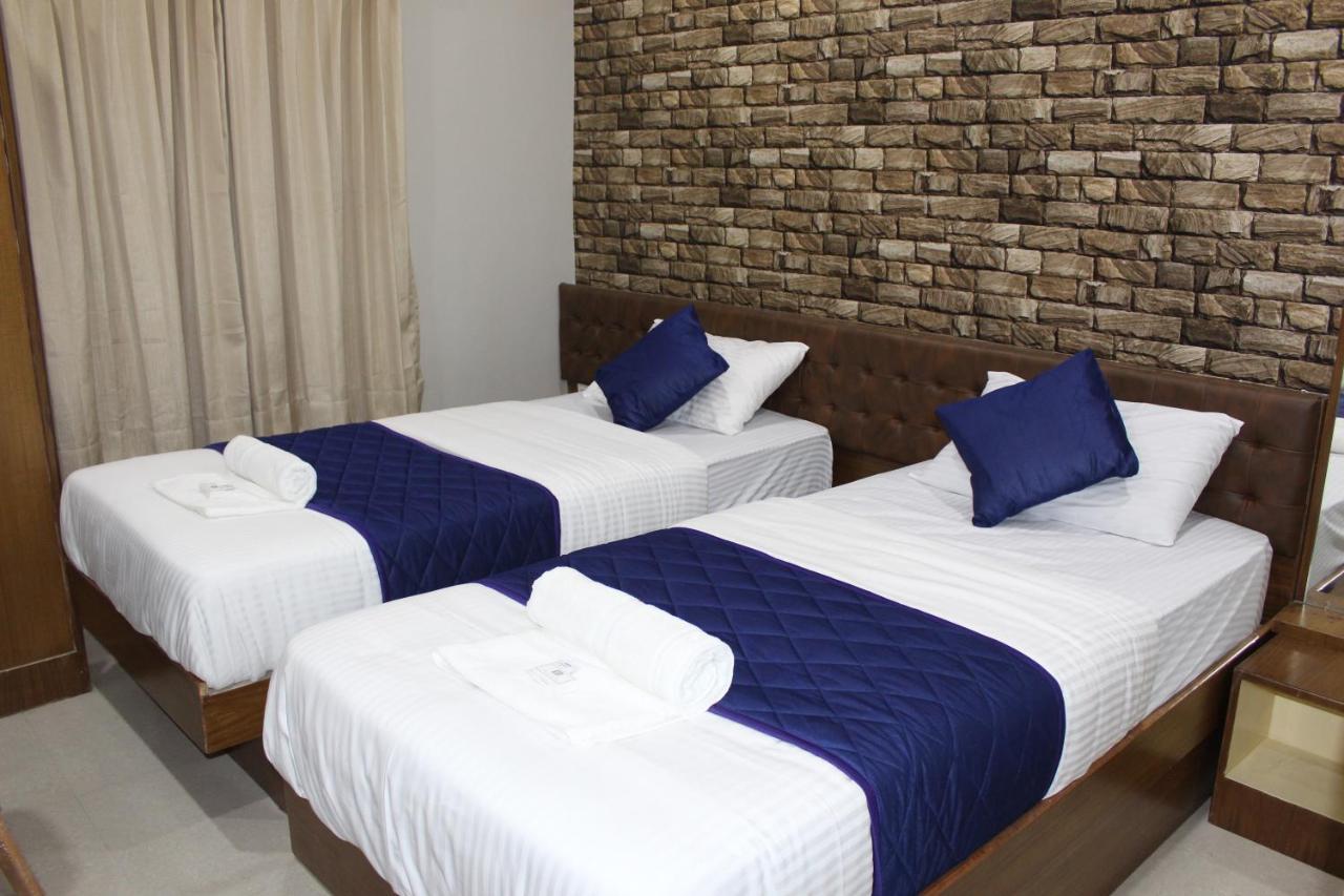 Olivia Inn And Suites Bengalúr Exteriér fotografie